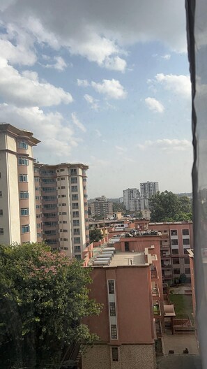 A residential area with multi-story buildings, some with visible balconies and windows. - Modern One-Bedroom serviced apartment/ 9th floor/ gym, lift, balcony, city view (Nairobi)