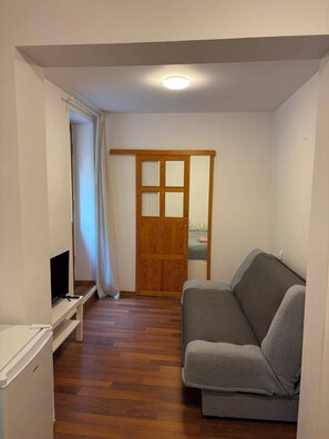 Comfort Quadruple Room | Ruang tamu