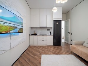Appartement, uitzicht op stad | Woonruimte