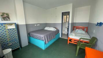 Economy Triple Room | Laptop workspace, blackout drapes, WiFi (free)