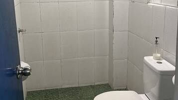 Economy Triple Room | Bathroom | Shower, towels, soap, toilet paper