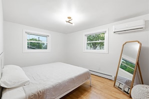 Room - Renovated split-level with killer Lambeau Field views. Super short walk to games & Titletown District. Fully fenced yard. 3 bedrooms + bath upstairs, kitchen/dining main, living room lower, bedroom + bath lowest level. Perfect game-day base! (Green Bay)