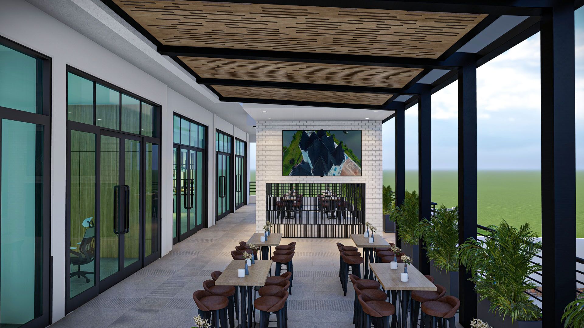 A modern outdoor dining area with glass walls, a large painting, and a view of the sea.
