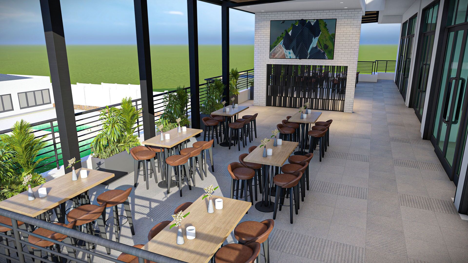 Un espace de restauration extérieur moderne, doté de plusieurs tables et chaises, et offrant une vue sur un plan d’eau.