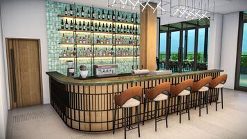 A bar area with a curved counter, multiple shelves of bottles, and a view through large windows.