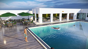 A swimming pool area with a bar, outdoor seating, and umbrellas.
