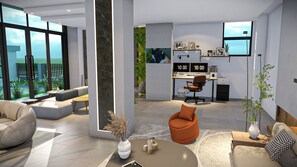 A modern office space with a desk, computer, and office chair.