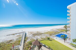 A beachfront hotel with a pool, beach access, and a clear view of the ocean. - Phoenix I 1043 2 Bedroom Condo (Orange Beach)