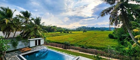 Suite, Balcony, Pool View | Pool | Outdoor pool
