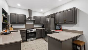 Coffee/tea maker, fridge, microwave, oven