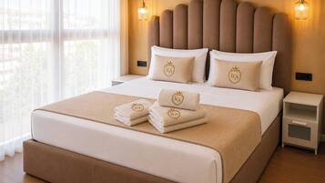 Roupas de cama premium, edredons de pluma, cofres nos quartos