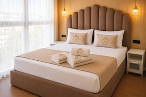 Roupas de cama premium, edredons de pluma, cofres nos quartos