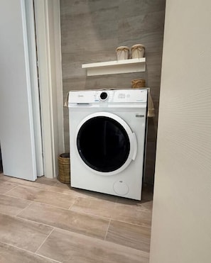 Departamento Confort, balcón, vista a la ciudad | Interior