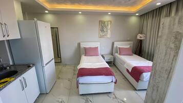 Deluxe-Vierbettzimmer, Balkon, Meerblick | Kostenloses WLAN