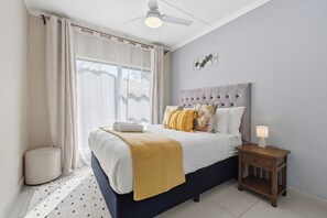 Iron/ironing board, Internet, bed sheets - Warm and Cosy Apartment | Ballito Village (Dolphin Coast)