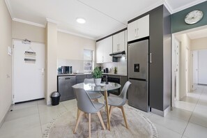 Fridge, microwave, oven, stovetop - Warm and Cosy Apartment | Ballito Village (Dolphin Coast)