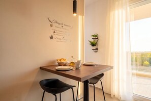 Dining - The Essential Suite V | Modern Studio with Balcony in Central Bari (Bari)