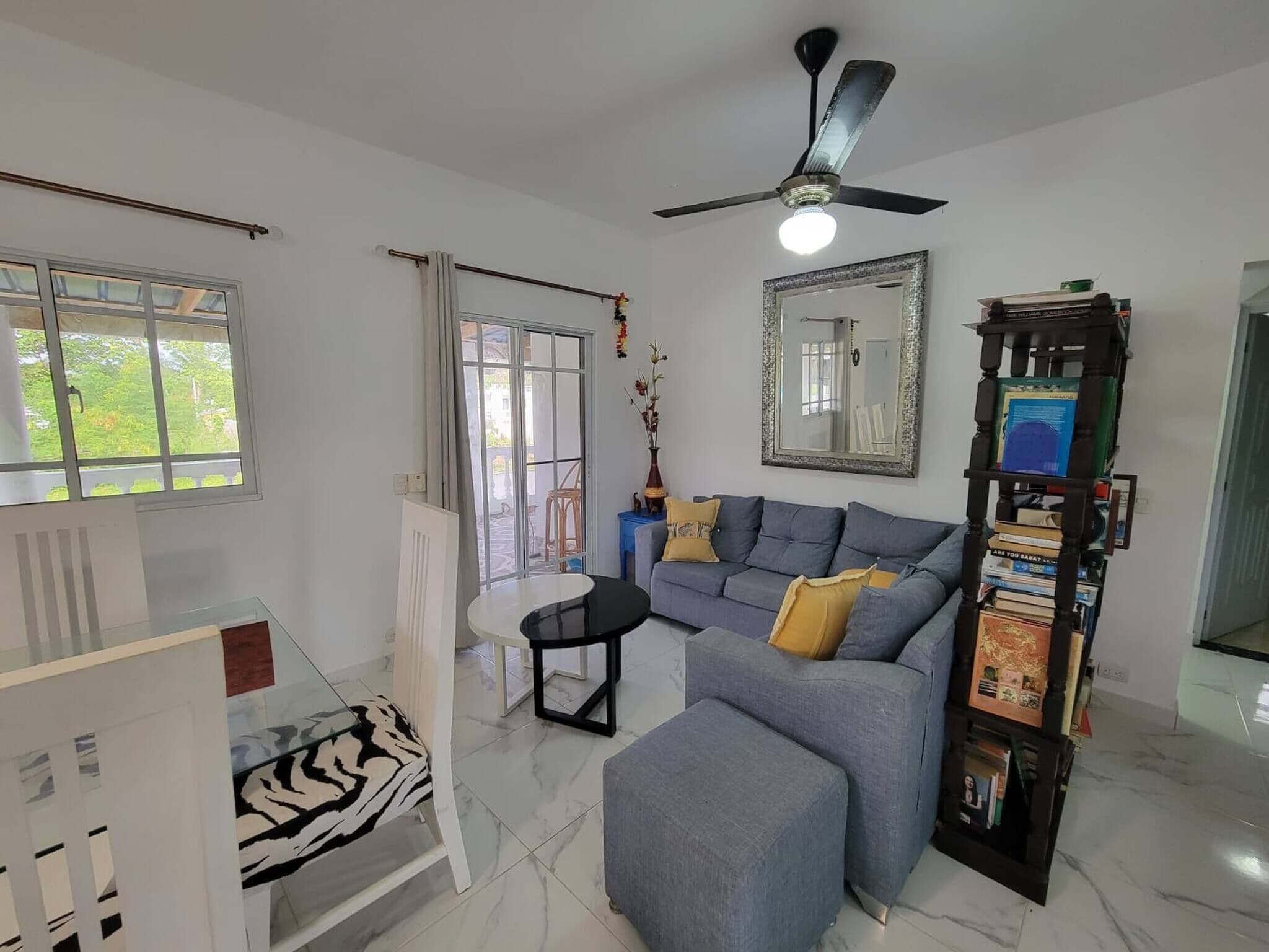 Apartment, 1 Bedroom, Smoking, Balcony | Living area | Books