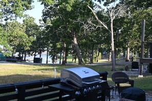 A barbecue grill with a water feature in the background. - Lakeview Cottage Table Rock Lake Walk to Port of Kimberling Marina (Kimberling City)