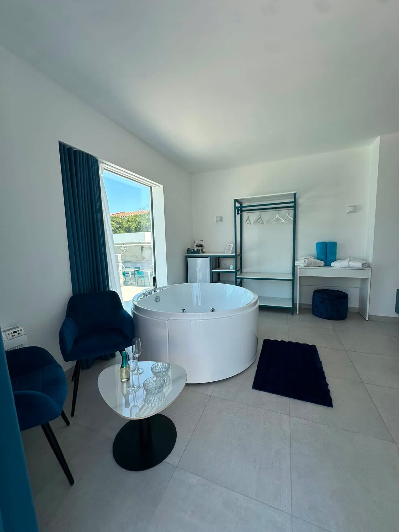 Shower, jetted tub, hair dryer, towels