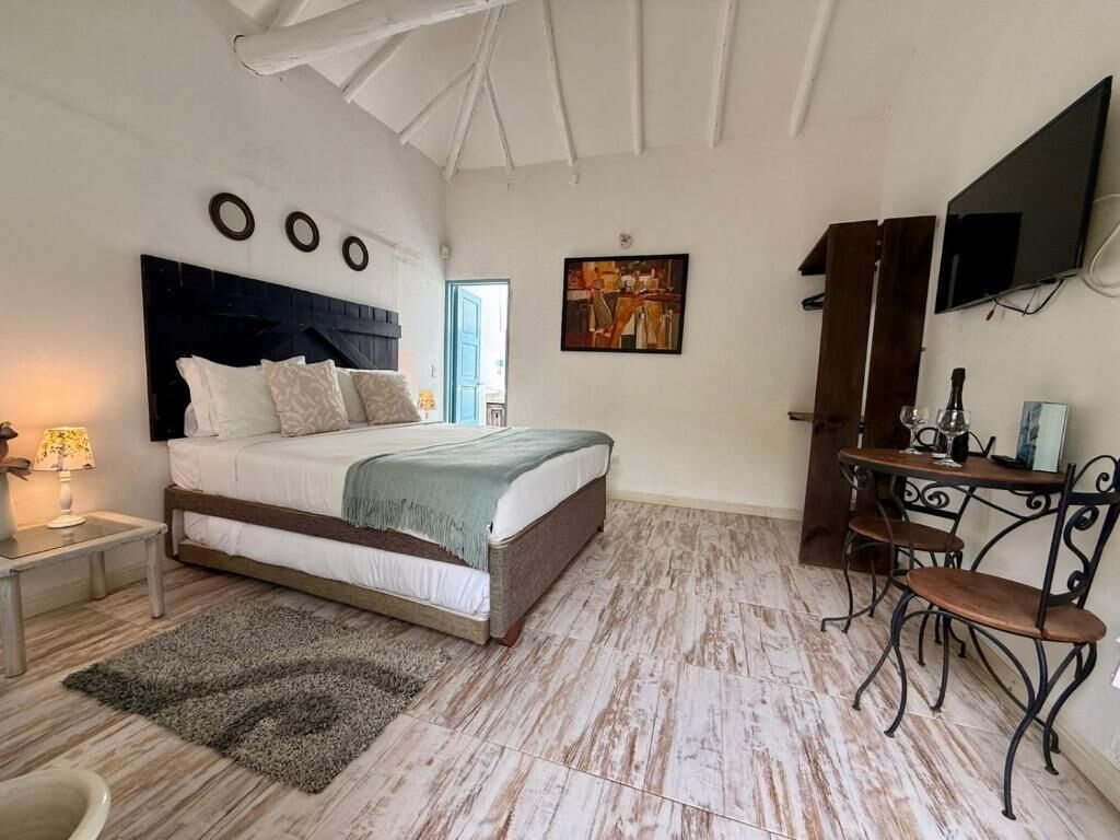 Habitación cuádruple Deluxe, patio, vistas al patio | Wifi gratis