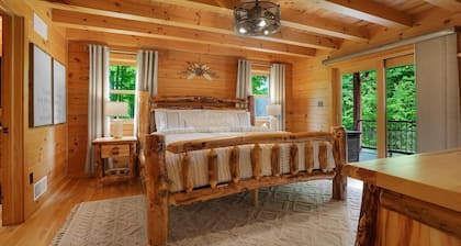 Triple Trac Lodge, upscale retreat in the countryside with 7 Bedrooms, hot tub, game room, and so much more. Plenty of fun for everyone!