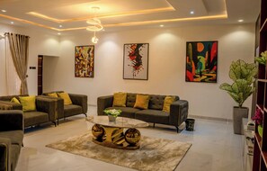 Living area - Stonehaven 2-bedroom apartment with AC, PS5, Security & Light in Oluyole Ibadan (Ibadan)