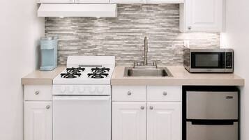 Suite Deluxe, varias camas, cocina | Cocina privada