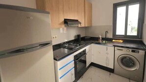 Private kitchen - Stunning new apartment just a stone's throw from the beach (Martil)