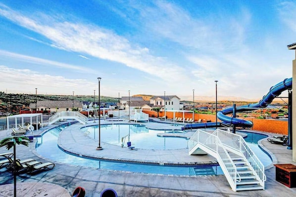 A water park with multiple slides and a central pool area. - Brand New 5BR Zion National Park - Patio (Washington)