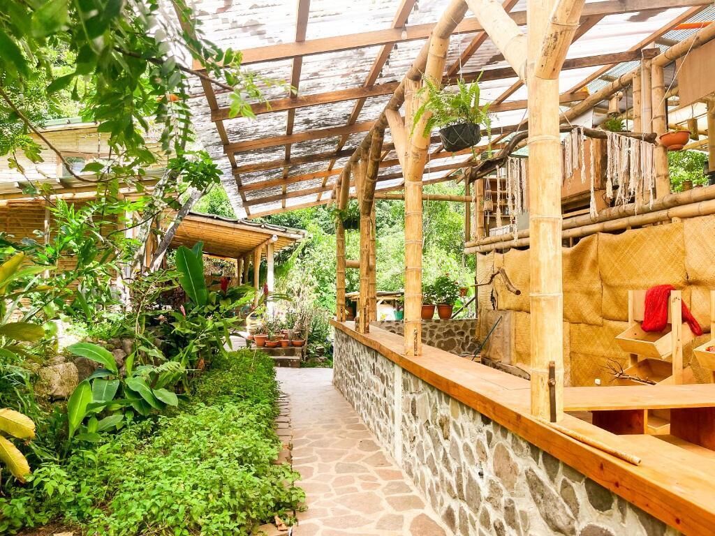 Habitación familiar, vistas al patio | Jardines del alojamiento
