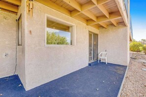 A building exterior with a covered porch, a window, and a door. - Sunny 2BR Mountainview Zion National Park (St. George)