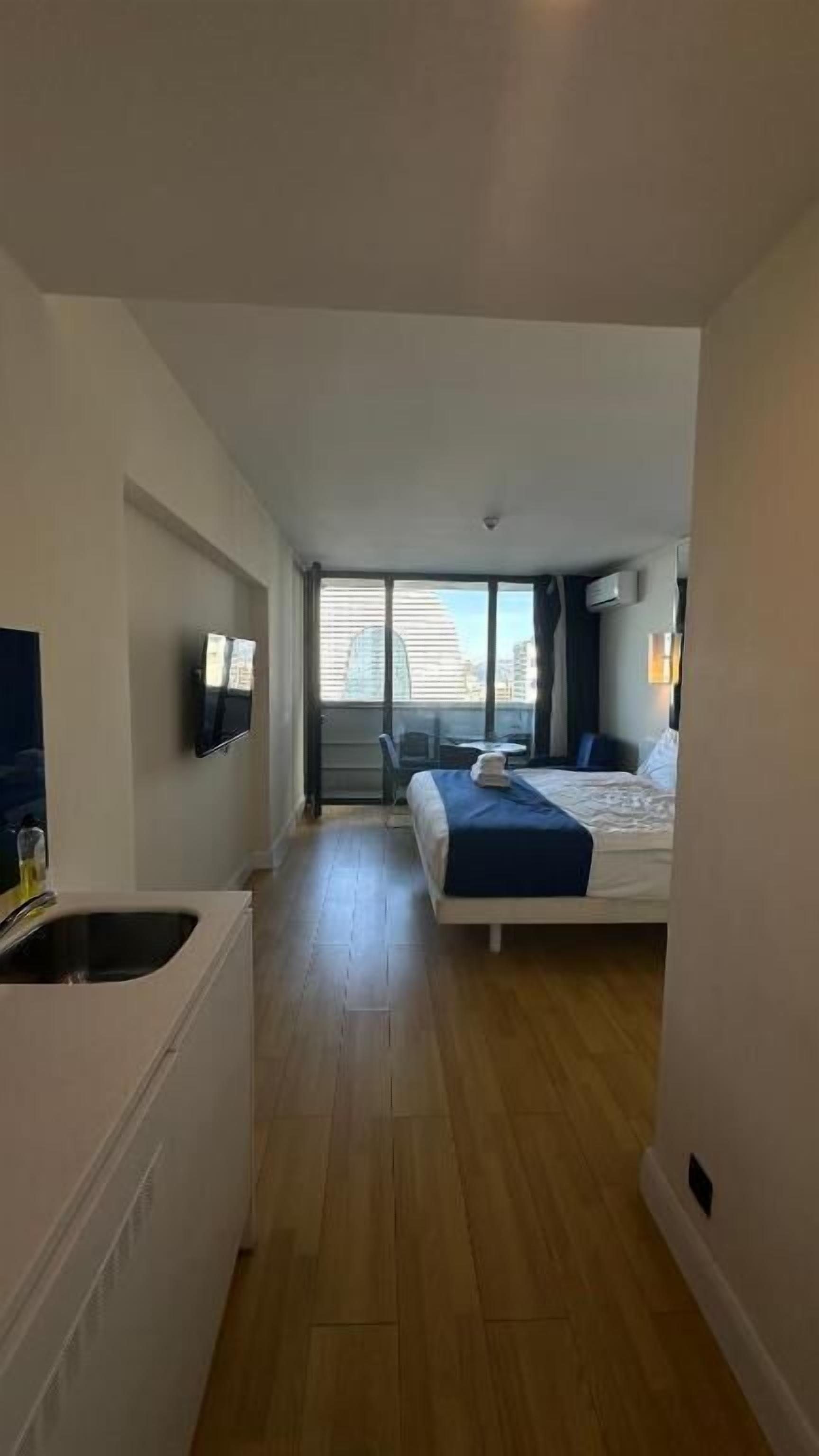 Double Room, Balcony, City View | Iron/ironing board, free WiFi