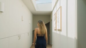 A corridor with skylights, wooden flooring, and white walls. - Douro Olive Hills Village - by FERO (Alijo)