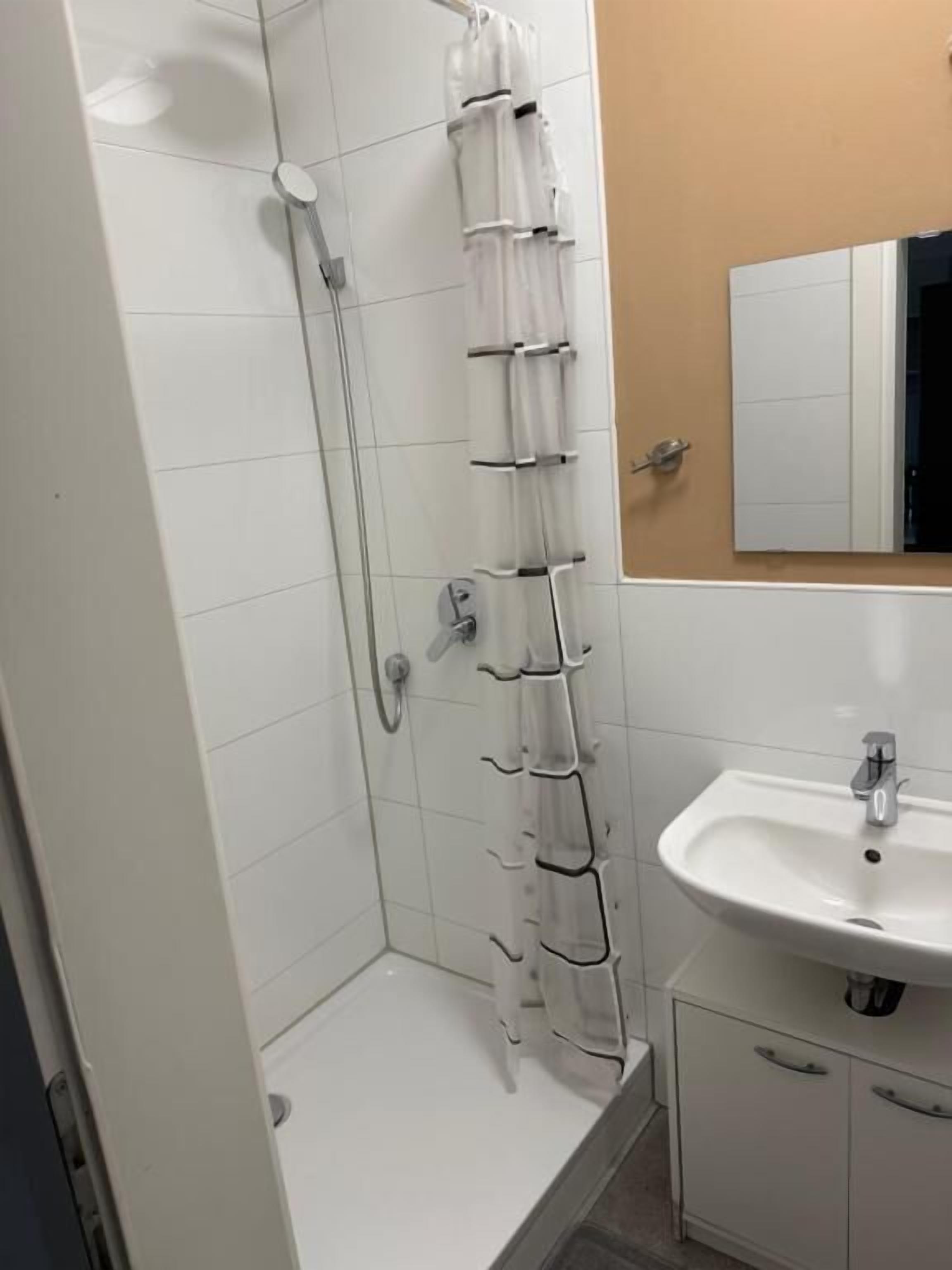 Apartemen Klasik, pemandangan kota | Kamar mandi | Pengering rambut, handuk, sabun, dan sampo