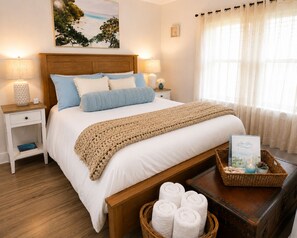 1 habitación, tabla de planchar con plancha y cuna de viaje 