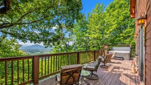 A deck with outdoor furniture, a barbecue grill, and a view of a mountainous landscape. - Stunning MTN and Valley Views! 3BR*Hot Tub*Privacy (Sevierville)