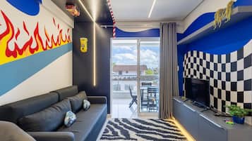 Basic Apartment | Living area | 40-inch TV with digital channels