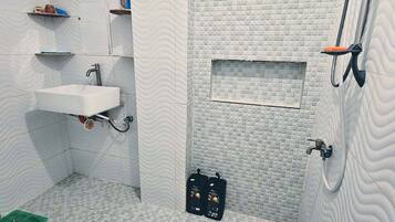 Bidet, towels, toilet paper