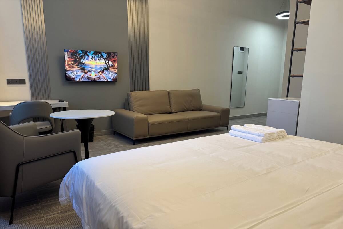 Superior Double Room, City View | Desk, laptop workspace, blackout drapes, iron/ironing board (on request)