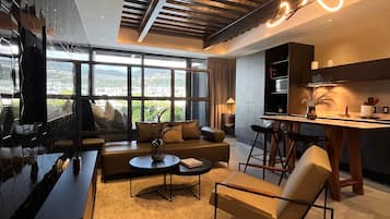 Deluxe appartement, uitzicht op de stad | Woonruimte