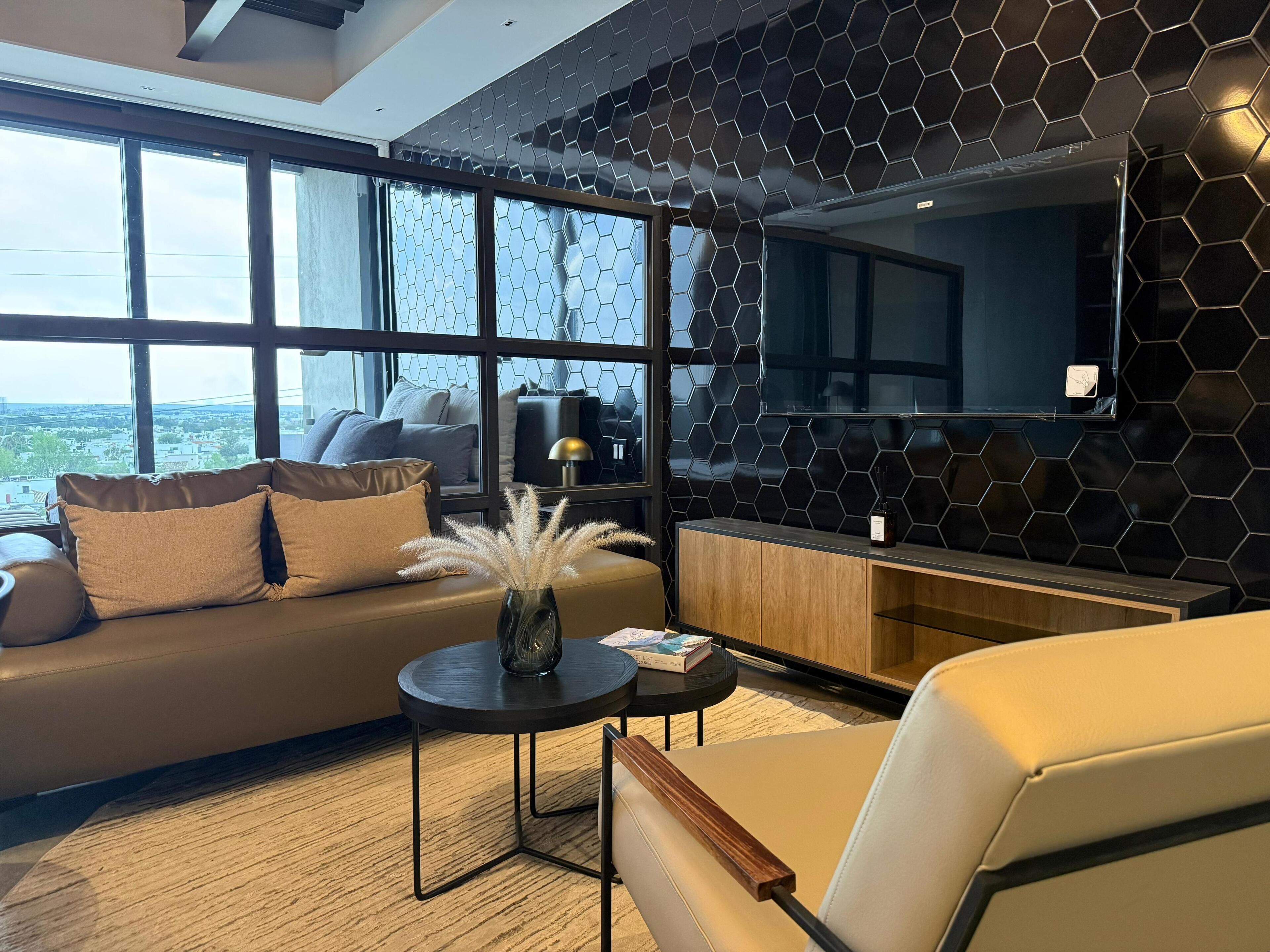 Apartamento Deluxe, vistas a la ciudad | Zona de estar