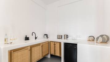 Suite Deluxe, vista al mar | Interior