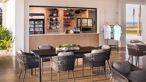 A bar area with seating and a view of the ocean. - South Seas Resort | 1BR Villa Near Captiva Landing (Captiva)