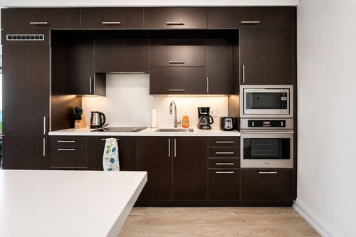 Cozy 2BR 2BA Condo | Steps to Subway | Pool & Gym