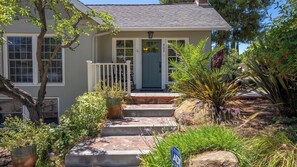A two-story house with a front porch, a blue door, and a mailbox. - Chateau Paso by Avantstay Pool Table + Private Deck Walk to Downtown Paso (Paso Robles)