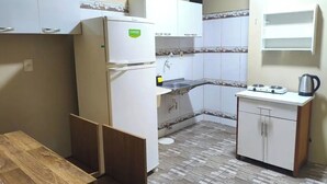 Departamento Confort, balcón | Cocina privada | Refrigerador con congelador 
