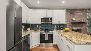 Fridge, dishwasher, cookware/dishes/utensils