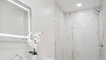 Shower, towels, soap, shampoo