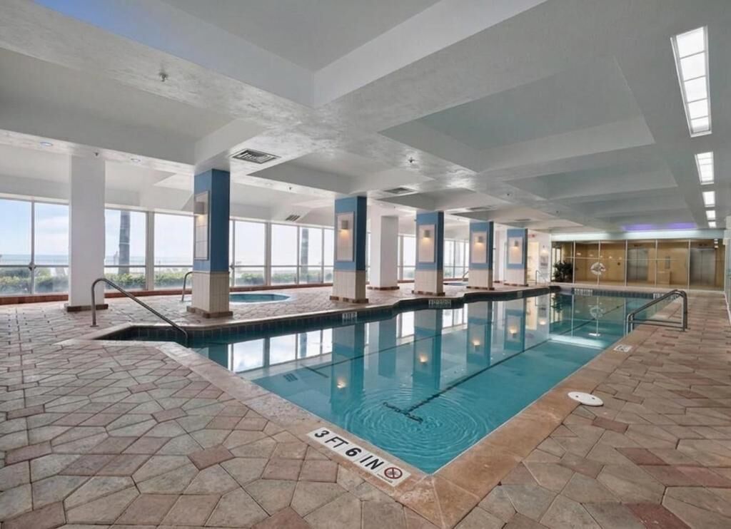 Luxury Apartment, Balcony, Ocean View | Pool | Indoor pool, 2 outdoor pools, pool umbrellas, sun loungers
